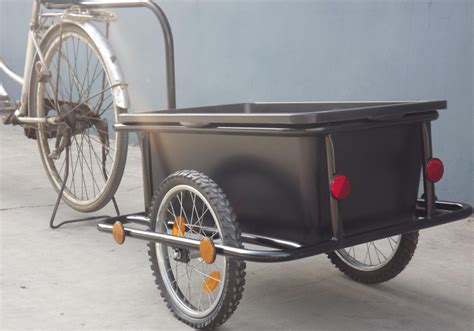 Made out of aluminum, the trailer easily connects to your bicycle by way of a Weber coupling. . Used bike trailer